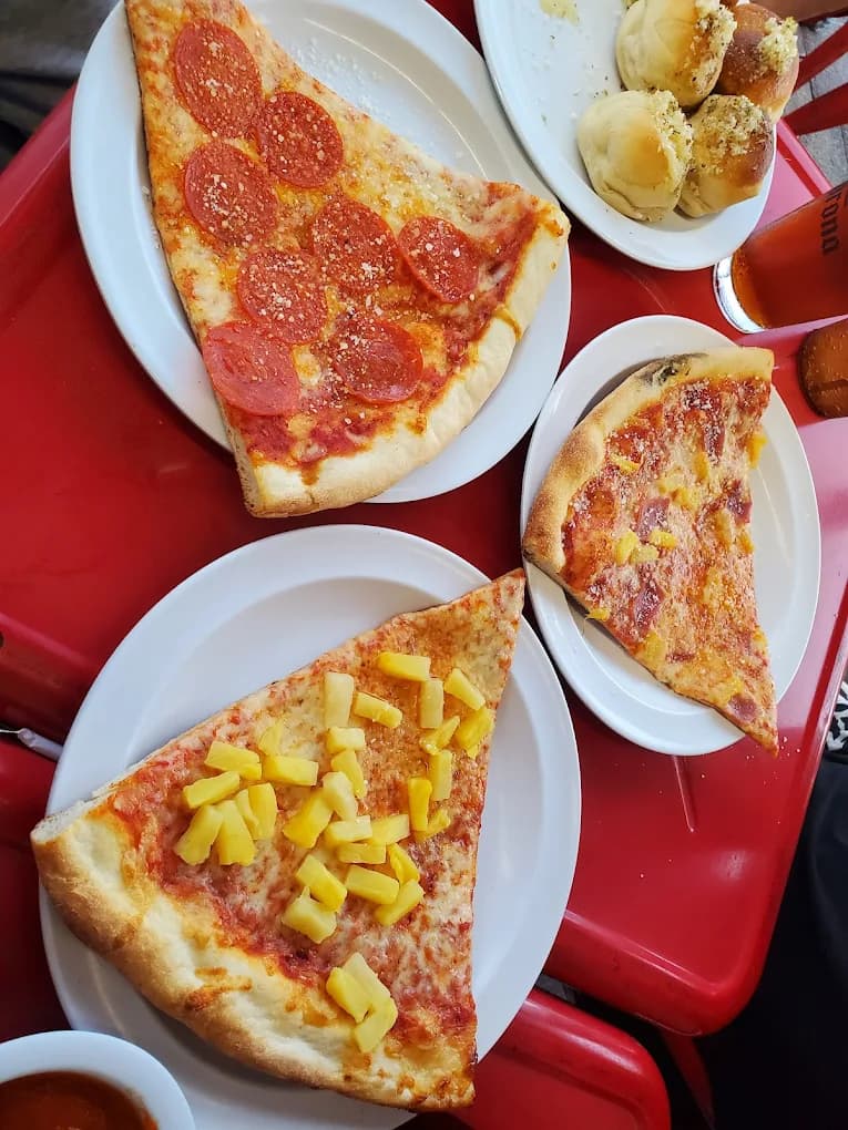 A snapshot of our amazing pizza dishes at Downtown Pizza.
